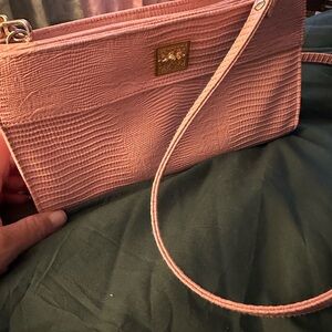 Chic Pink Textured Clutch by [Brand]